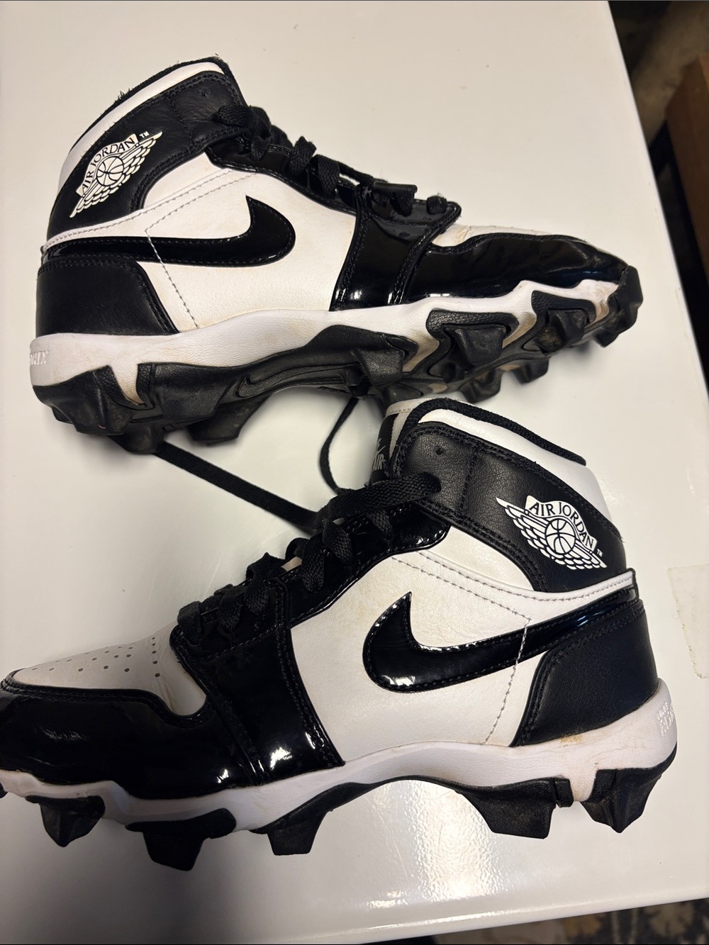 Jordan Kids Black & White High-Top Cleat Sneakers
